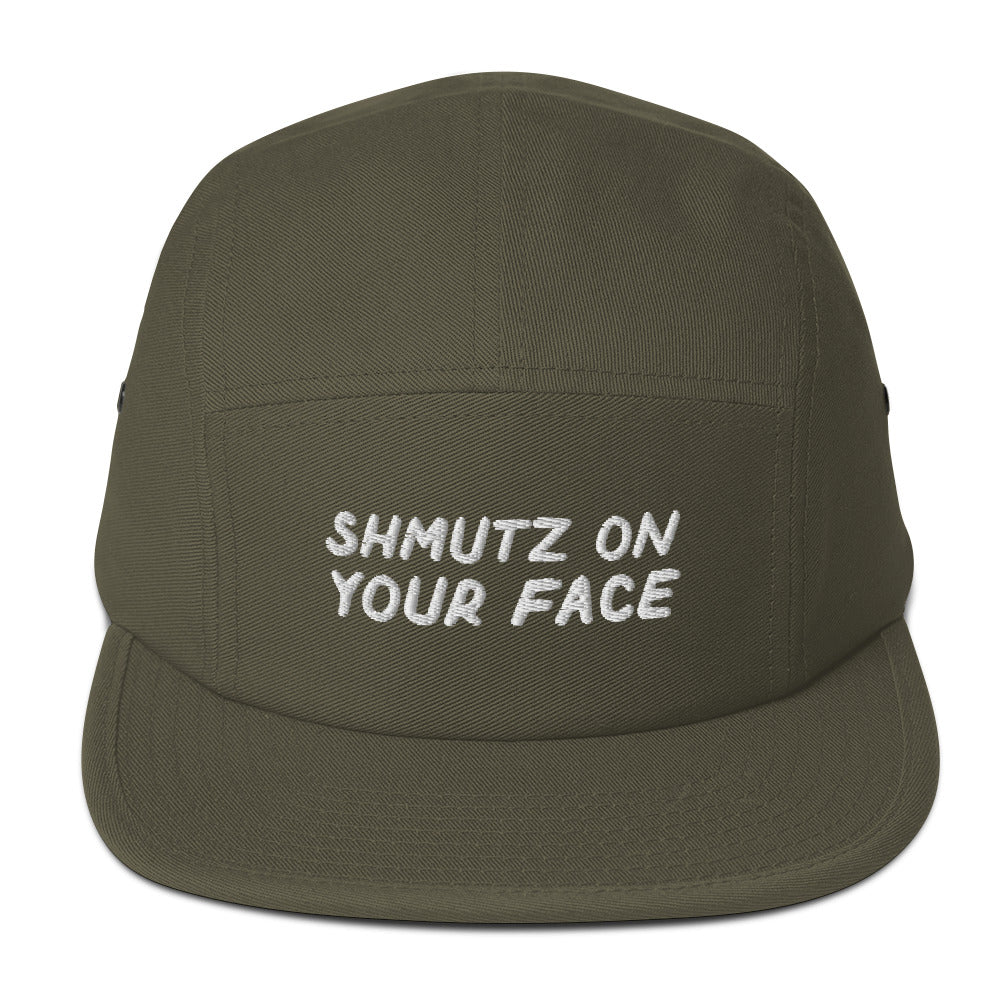 Shmutz on Your Face 5-panel cap in Olive, front view with embroidered phrase