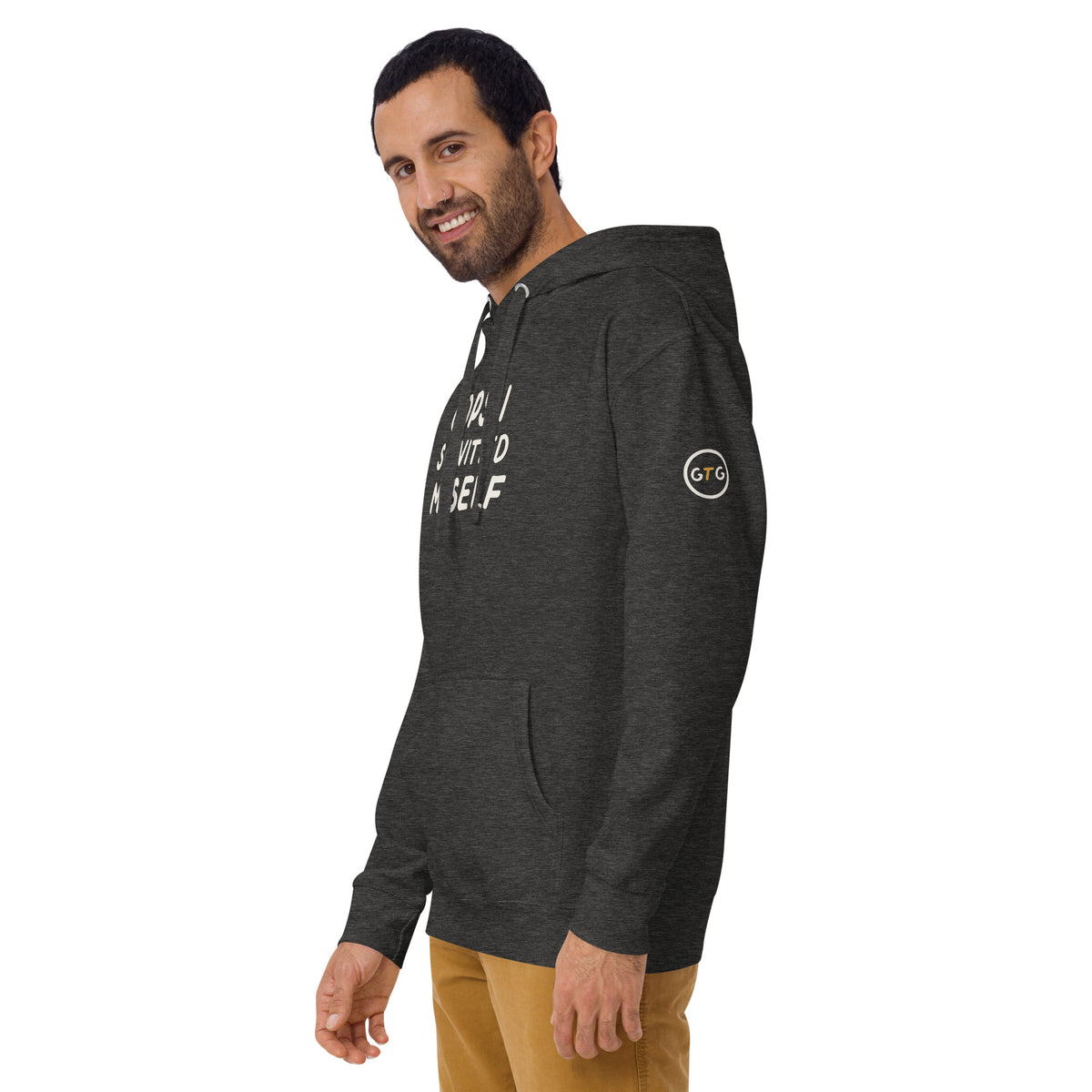 Model wearing the Good Thank God Oops I Schvitz'd Myself hoodie in Charcoal Heather, left front view showing the GTG sleeve badge