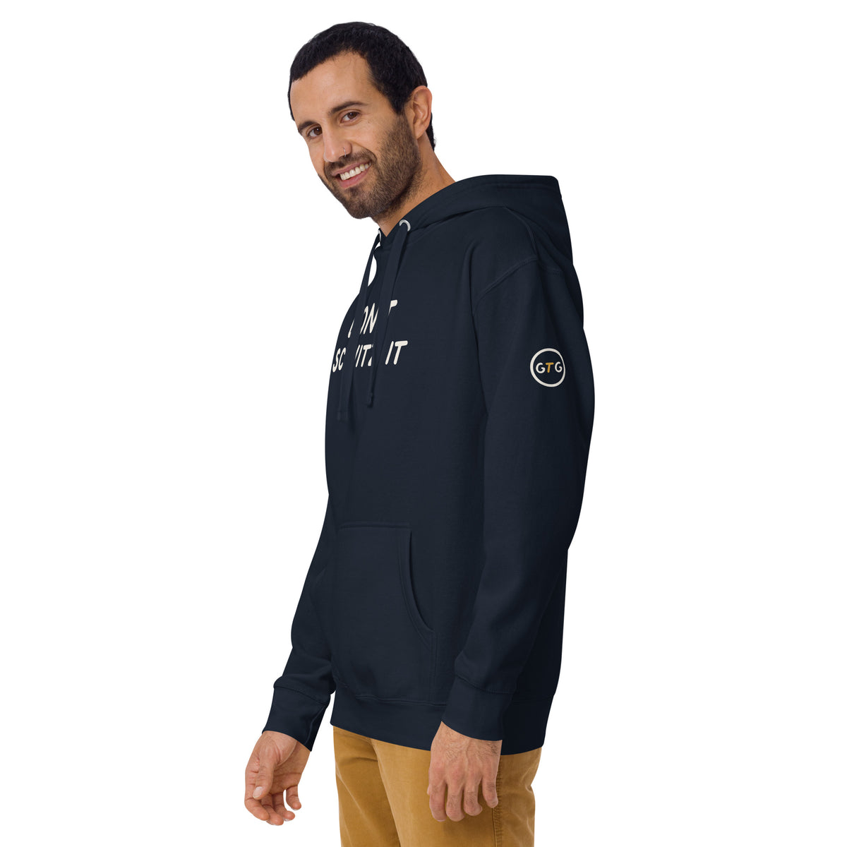 Model wearing the Good Thank God Don't Schvitz It hoodie in Navy Blazer, left front view showing the GTG sleeve badge