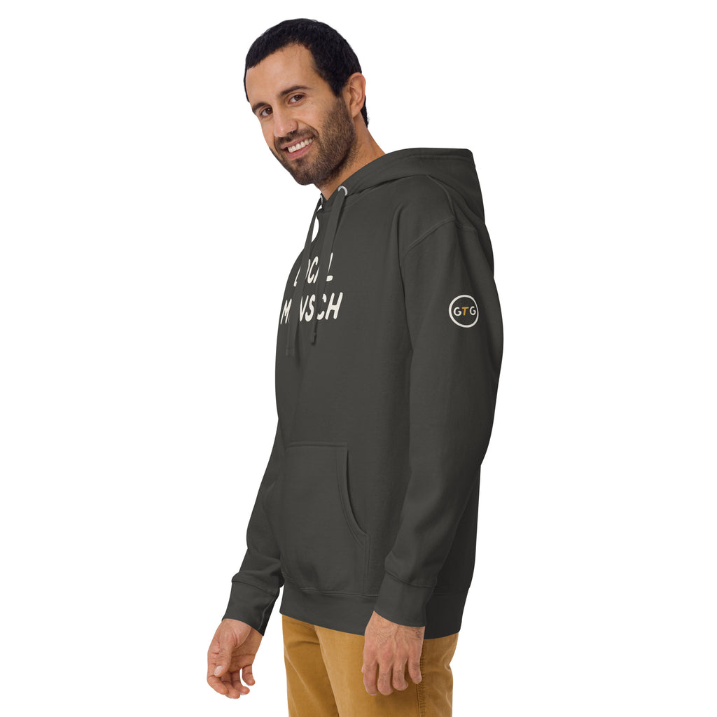 Model wearing the Good Thank God Local Mensch hoodie in Vintage Black, left front view showing the GTG sleeve badge